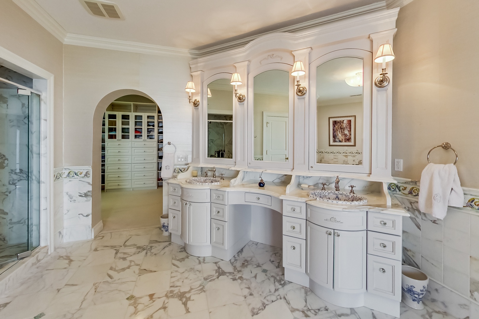 His-and-Hers vanities take on a whole new meaning, plus that huge dressing room!