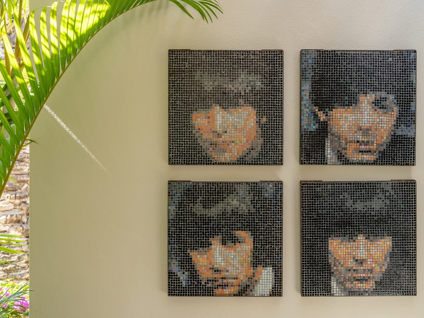 Admire these stunning mosaic artworks featuring majestic tigers, creating a beautiful focal point in your tropical retreat.