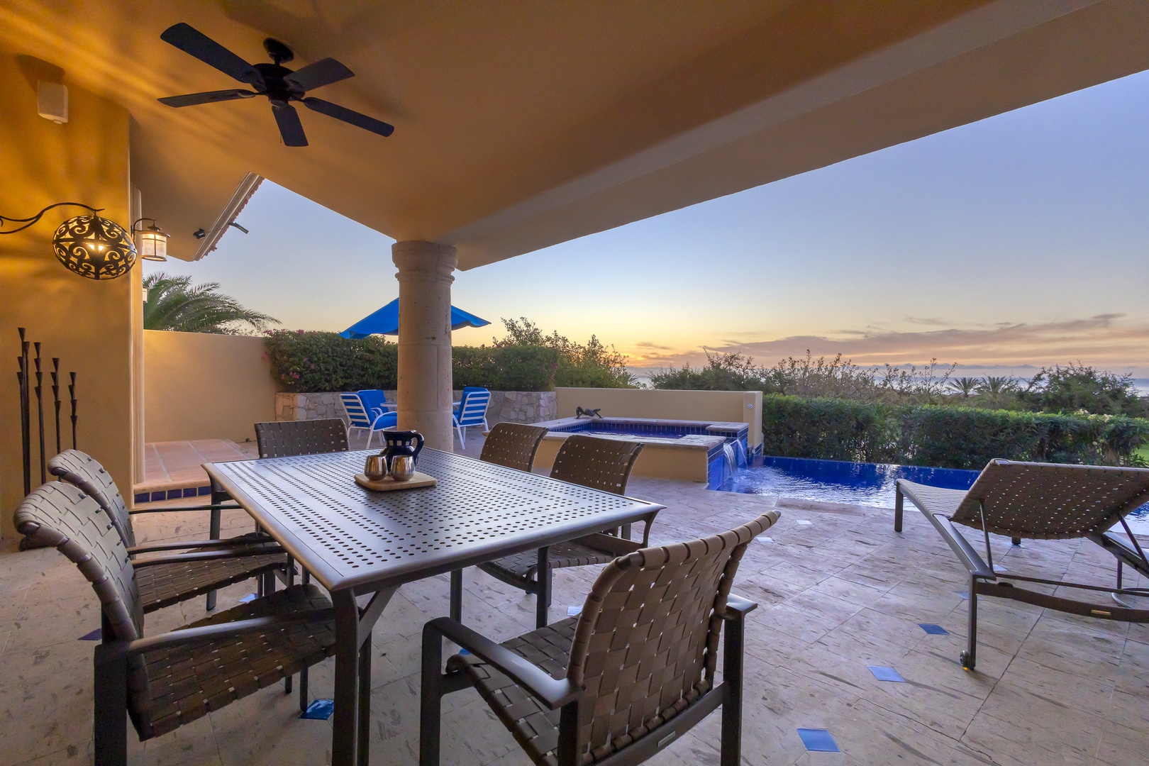 Sip your morning coffee on this covered terrace while watching the sunrise paint the sky over your private pool and ocean view.