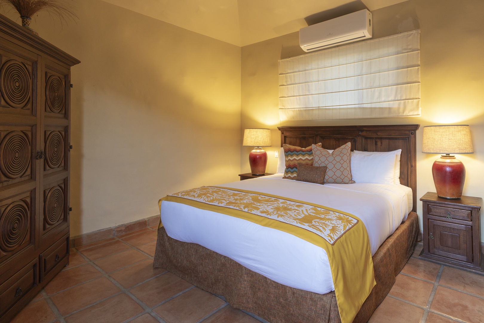 Sink into your beautifully appointed bedroom featuring handcrafted furnishings, crisp linens, and warm lighting that creates the perfect sanctuary.
