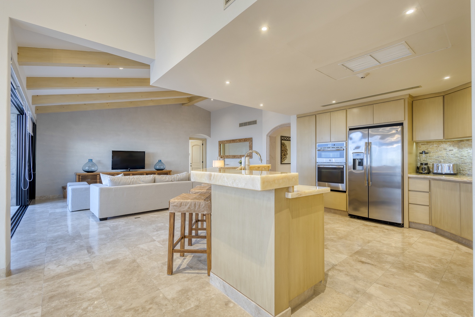 Your open-concept oasis blends living and culinary spaces with soaring ceilings, sleek finishes, and abundant natural light—perfect for gathering, cooking, and unwinding in style.