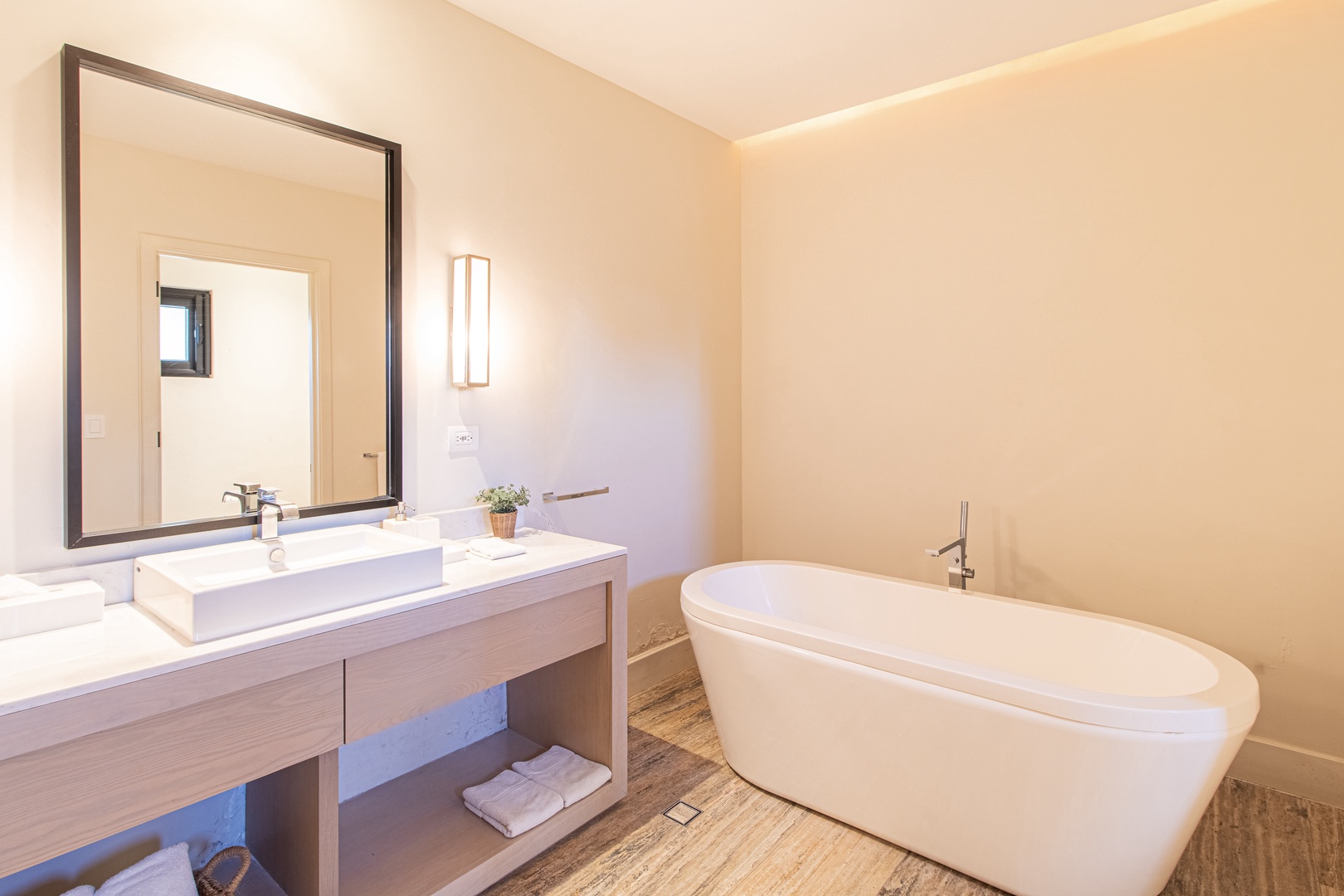 Slip into your own freestanding soaking tub after a day of exploring—warm lighting, soothing tones, and a peaceful atmosphere invite pure relaxation.