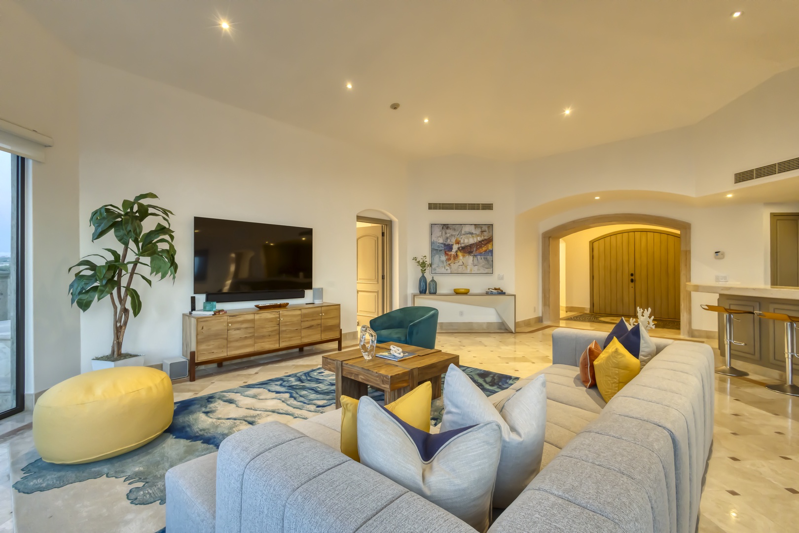 Picture yourself unwinding here after a day of adventure. Plush sofas, coastal-inspired accents, and abundant natural light create your perfect retreat for relaxation and connection.
