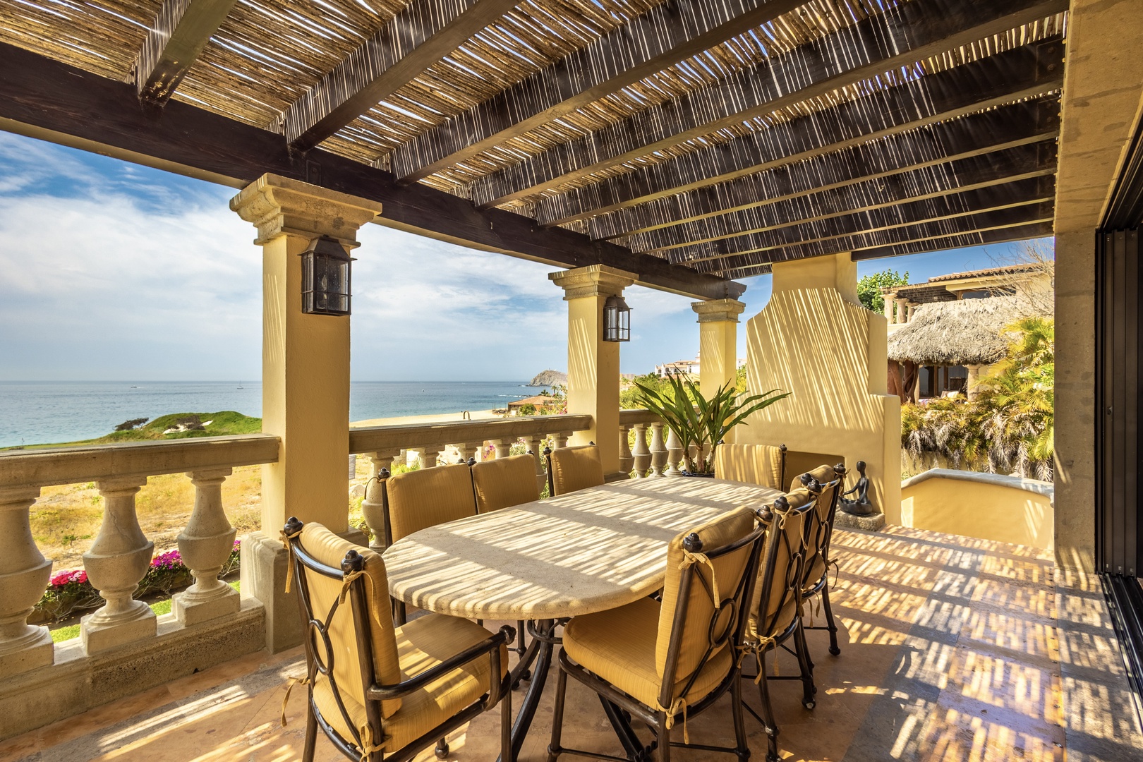 Start your mornings with coffee on this sunlit terrace, where ocean breezes and stunning sea views stretch endlessly before you. Perfect for unforgettable beachside dining moments.