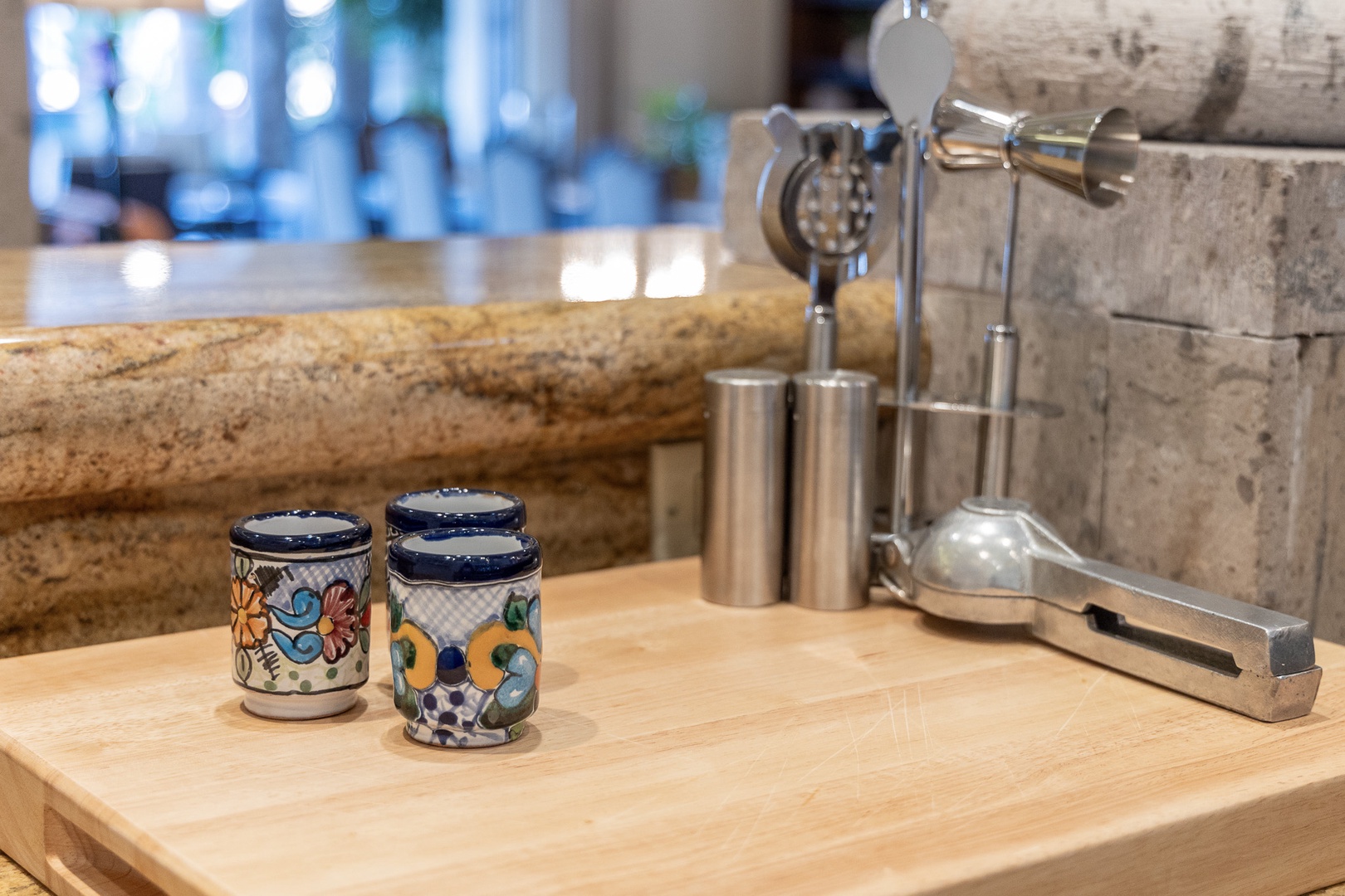 Colorful handmade ceramic shakers and sleek stainless-steel utensils sit ready on your kitchen counter, blending artisan charm with modern convenience for your culinary adventures.