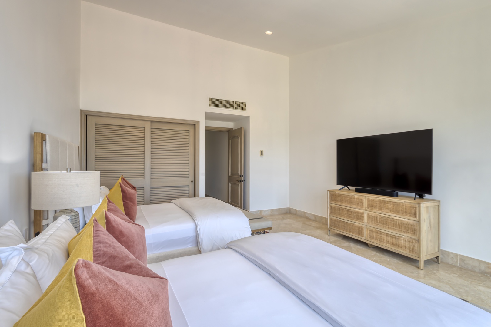 Settle into your serene bedroom with plush beds, modern entertainment, and climate control. Your restful retreat features natural light, ample storage, and thoughtful touches for ultimate comfort.