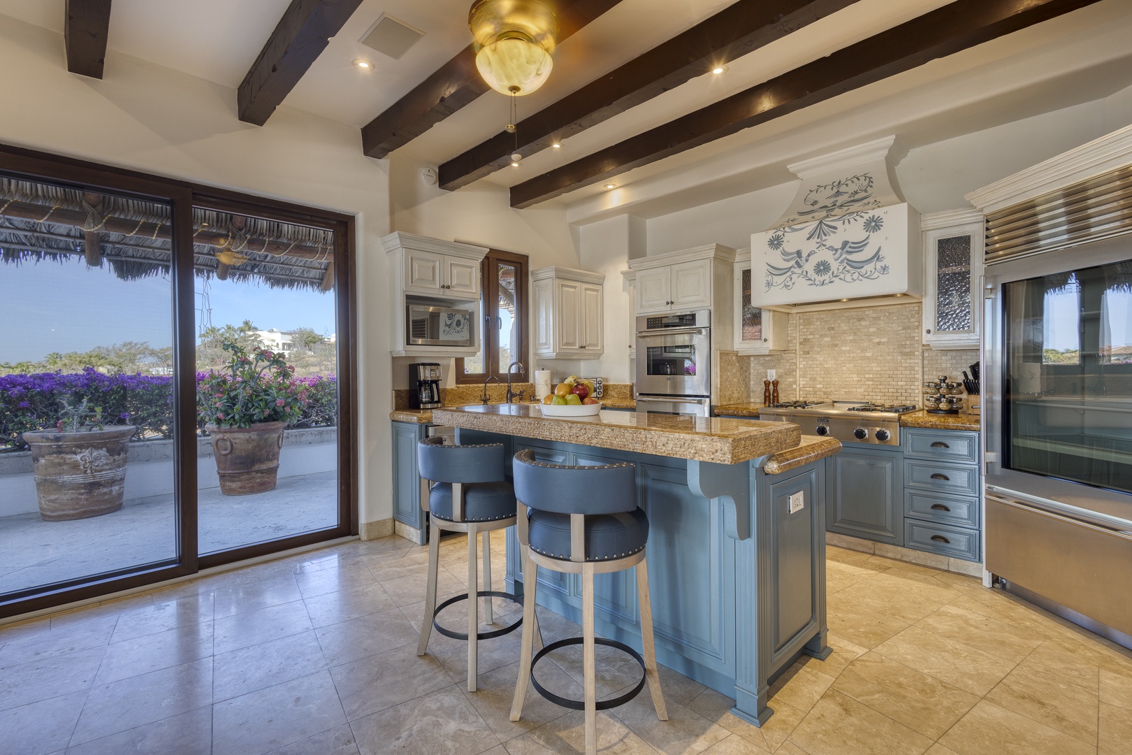 Your gourmet kitchen awaits with granite counters, premium appliances, and charming breakfast bar where you'll craft memorable meals.