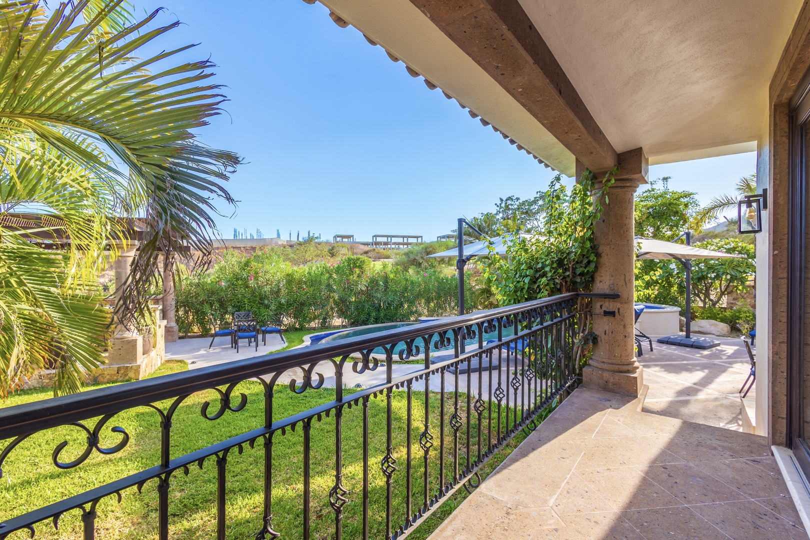Step onto your private terrace and breathe in views of lush gardens and swaying palms, a peaceful retreat where every morning feels like a getaway.