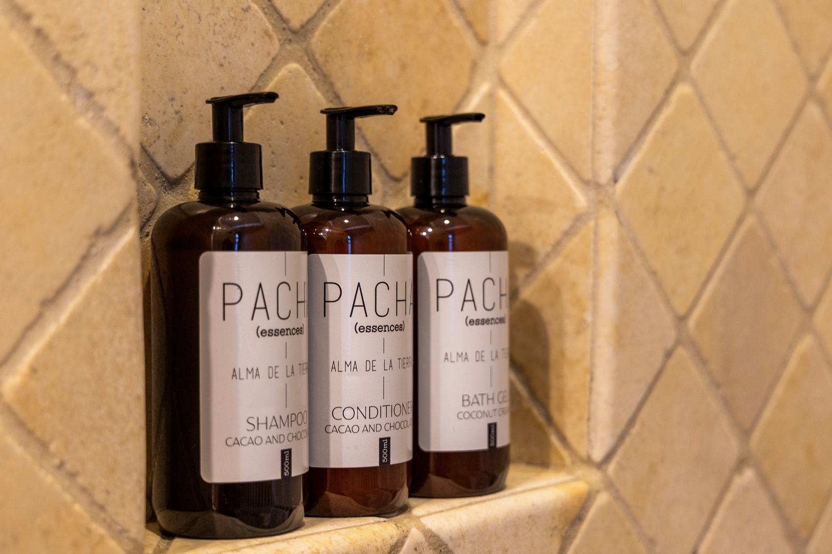 Premium bath amenities await you in your private bathroom, featuring luxurious shampoo, conditioner, and coconut-infused bath gel to elevate your stay.