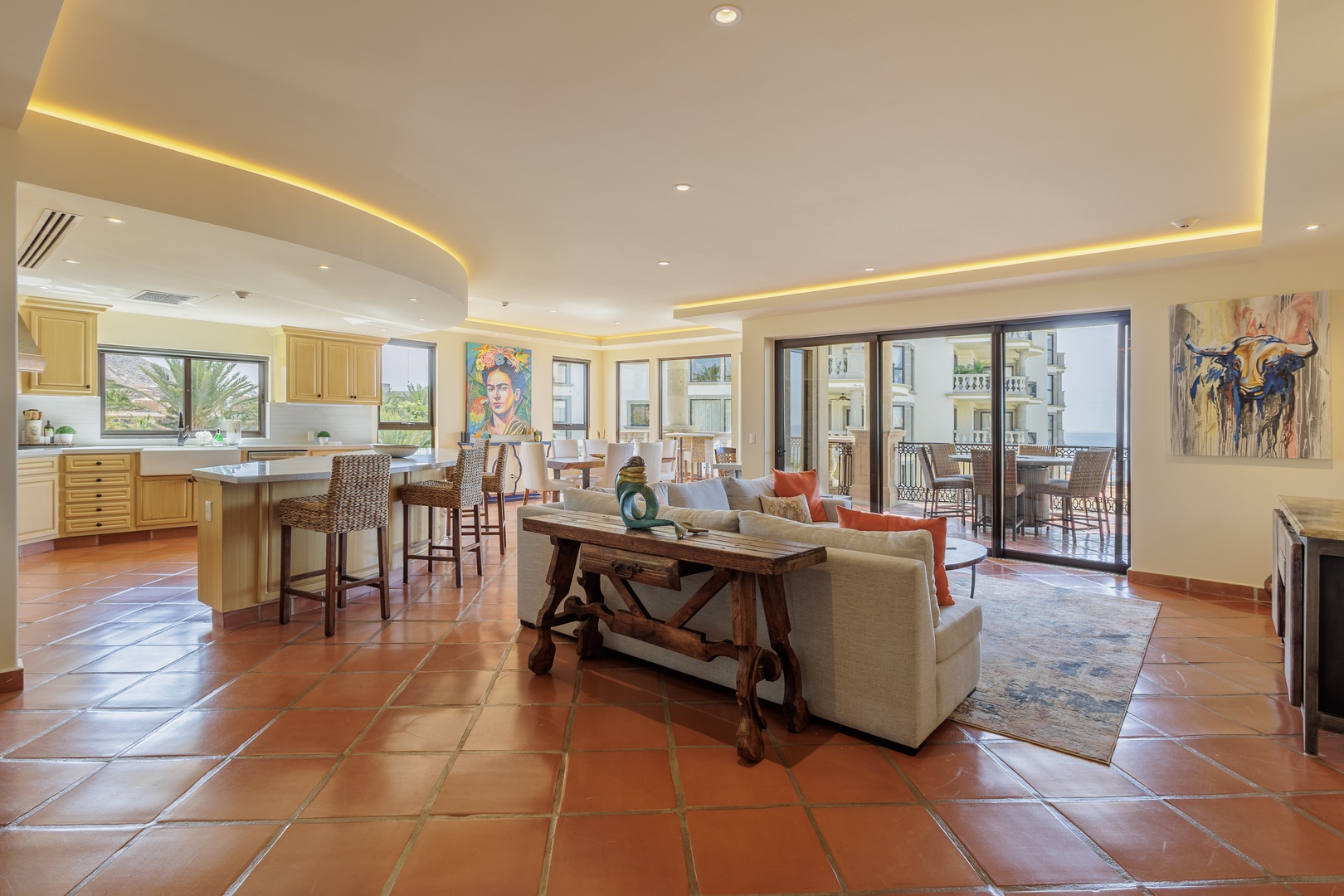 Settle into this beautifully designed open-concept space where the gourmet kitchen flows into the living area, perfect for gathering and relaxation. Step outside to your private terrace with breathtaking views.