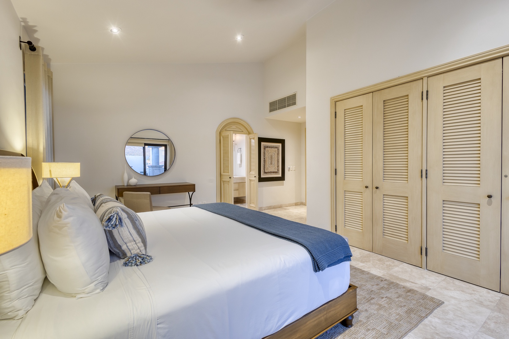 Unwind in your serene bedroom, where crisp linens and coastal touches invite restful nights. Enjoy generous closet space and a peaceful retreat designed for your comfort.