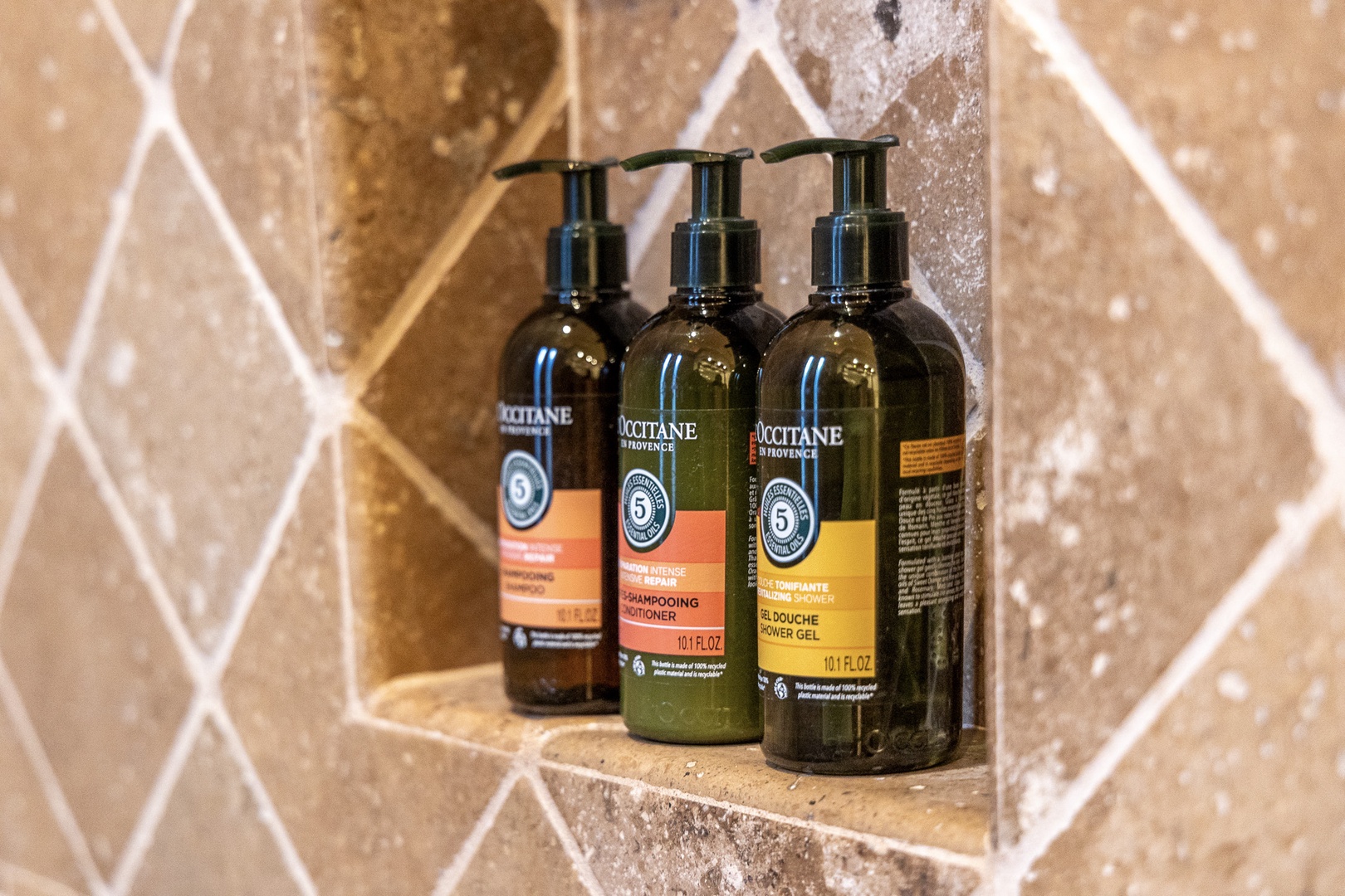 Luxury bath amenities await, offering premium L'Occitane products to elevate your daily refresh with elegant, spa-quality care.