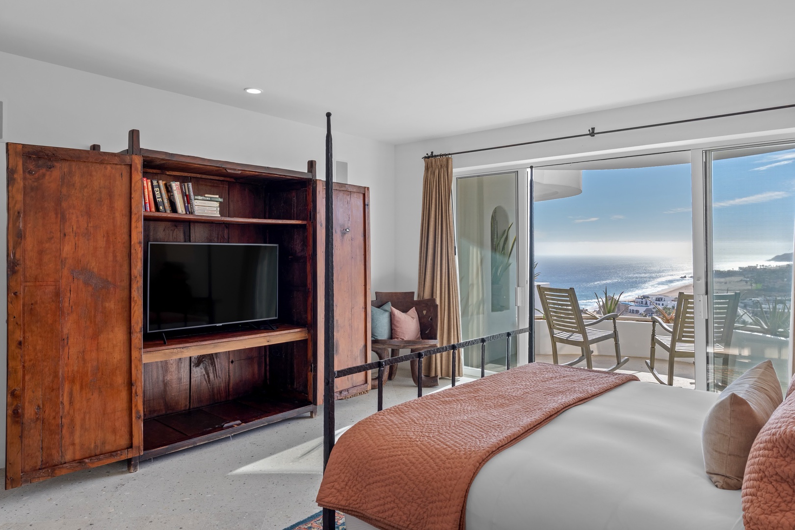 Wake to panoramic ocean views from your private balcony, unwind with entertainment on the wall-mounted TV, and drift to sleep in luxury linens.