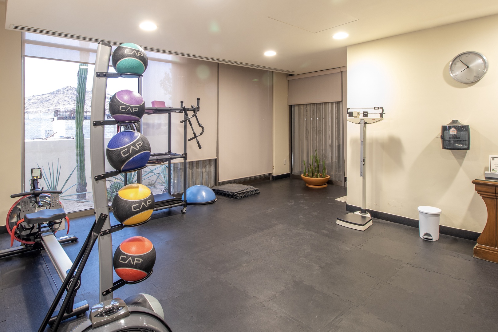 Stay active in this spacious fitness room with modern equipment and natural light. You'll enjoy working out with desert views through the large windows.