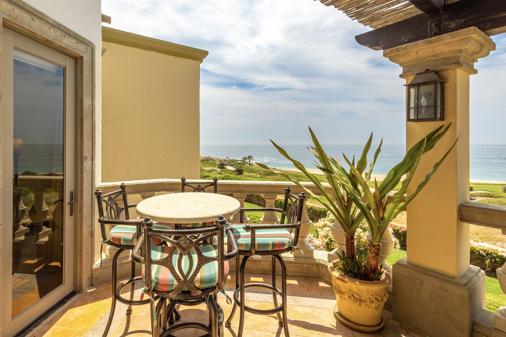 Sip your morning coffee at this oceanfront terrace where rolling green fairways meet the Pacific. Thoughtful design frames sweeping coastal views that stretch endlessly across the horizon.