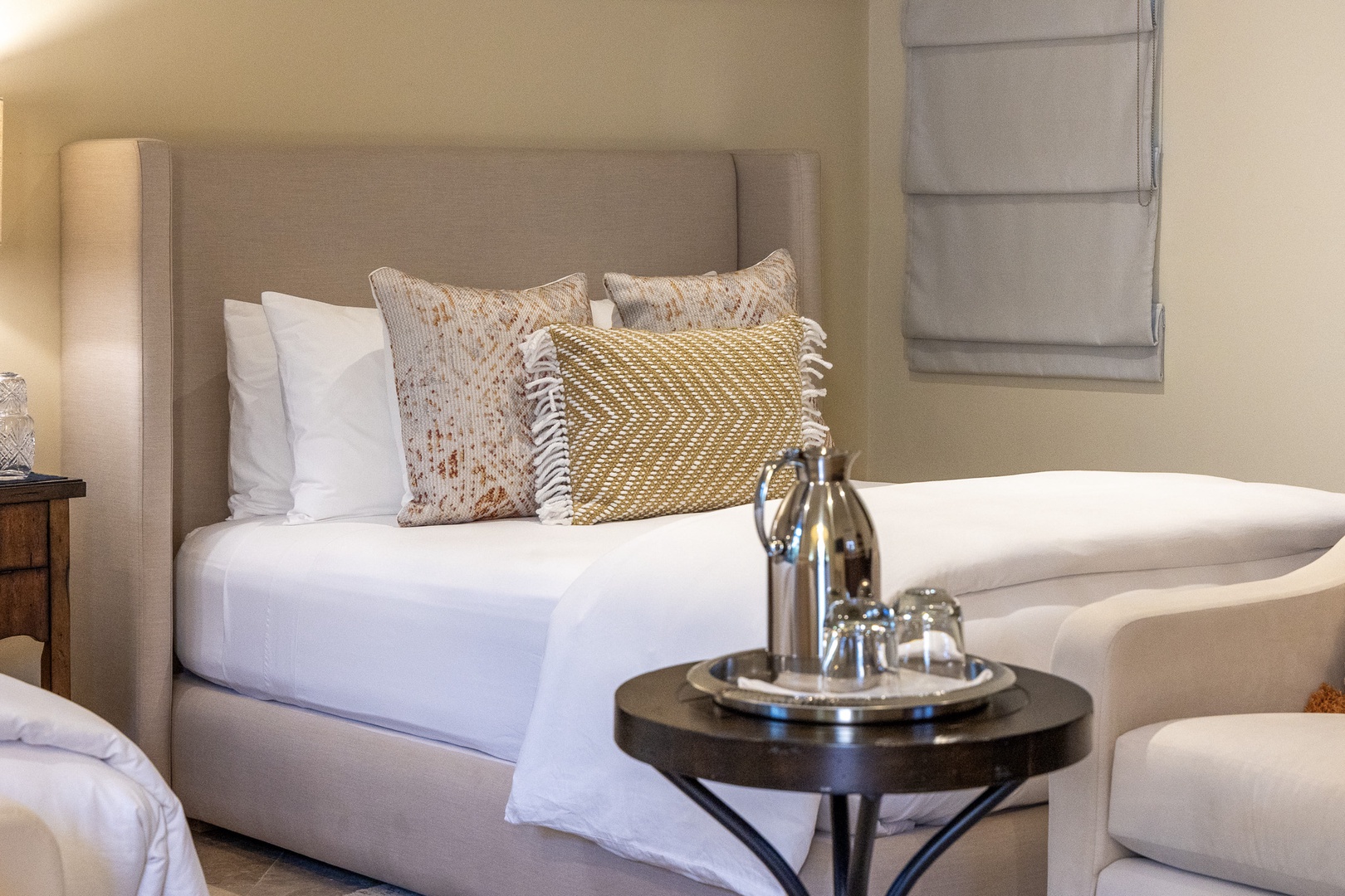 Sink into plush bedding and decorative pillows that invite you to unwind. Your restful retreat awaits with crisp linens and thoughtful design touches for a peaceful night's sleep.