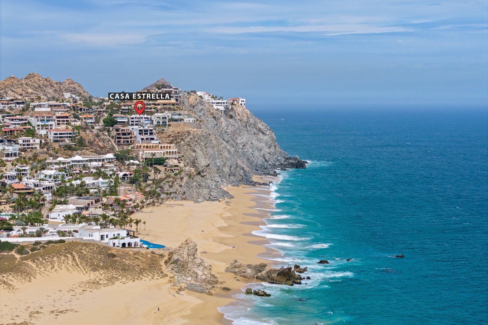 Aerial view of Casa Estrella's stunning coastal location, perched above pristine beaches and turquoise waters in this dramatic clifftop setting.