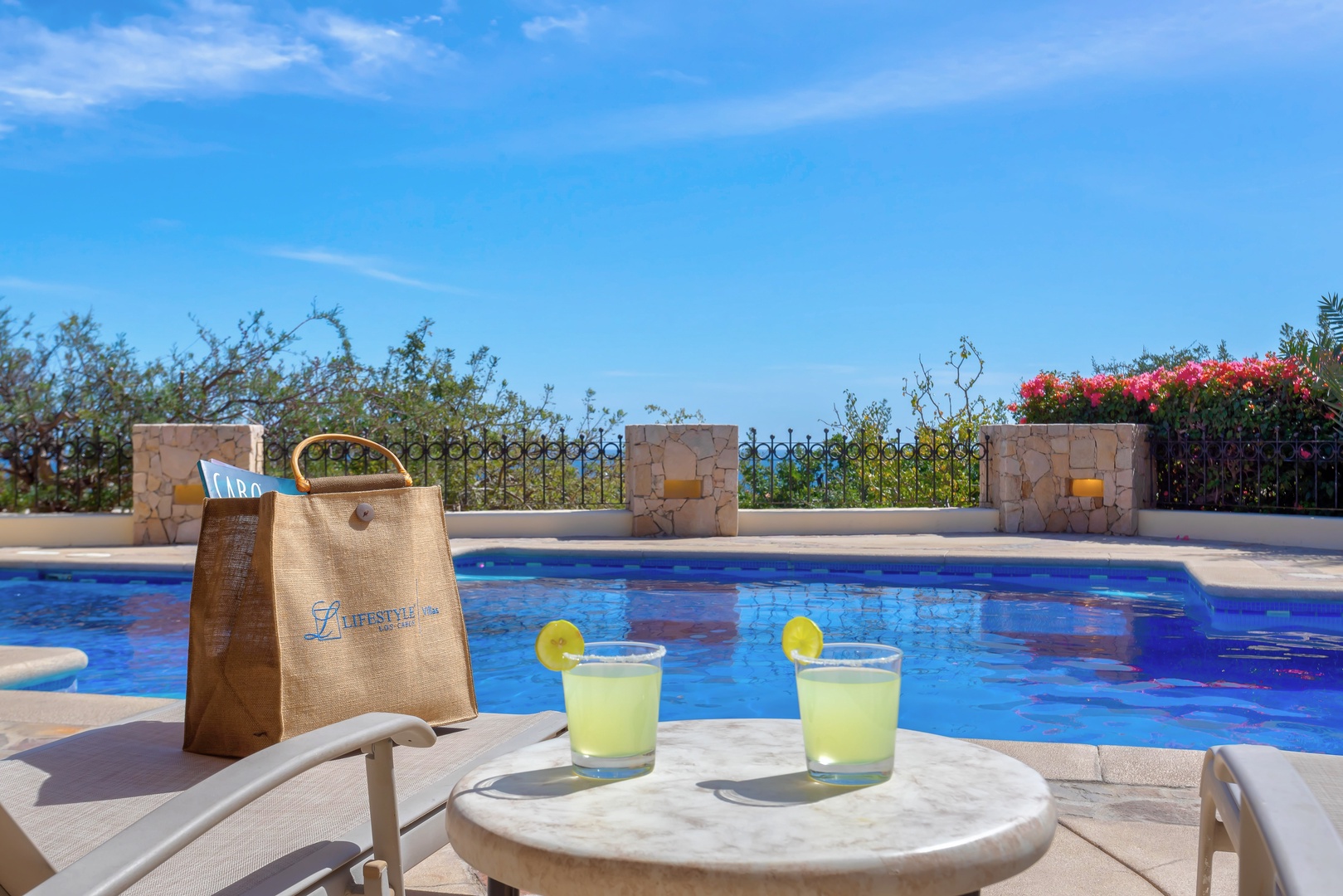 Sip refreshing drinks poolside while soaking up Mediterranean sunshine in your private oasis.