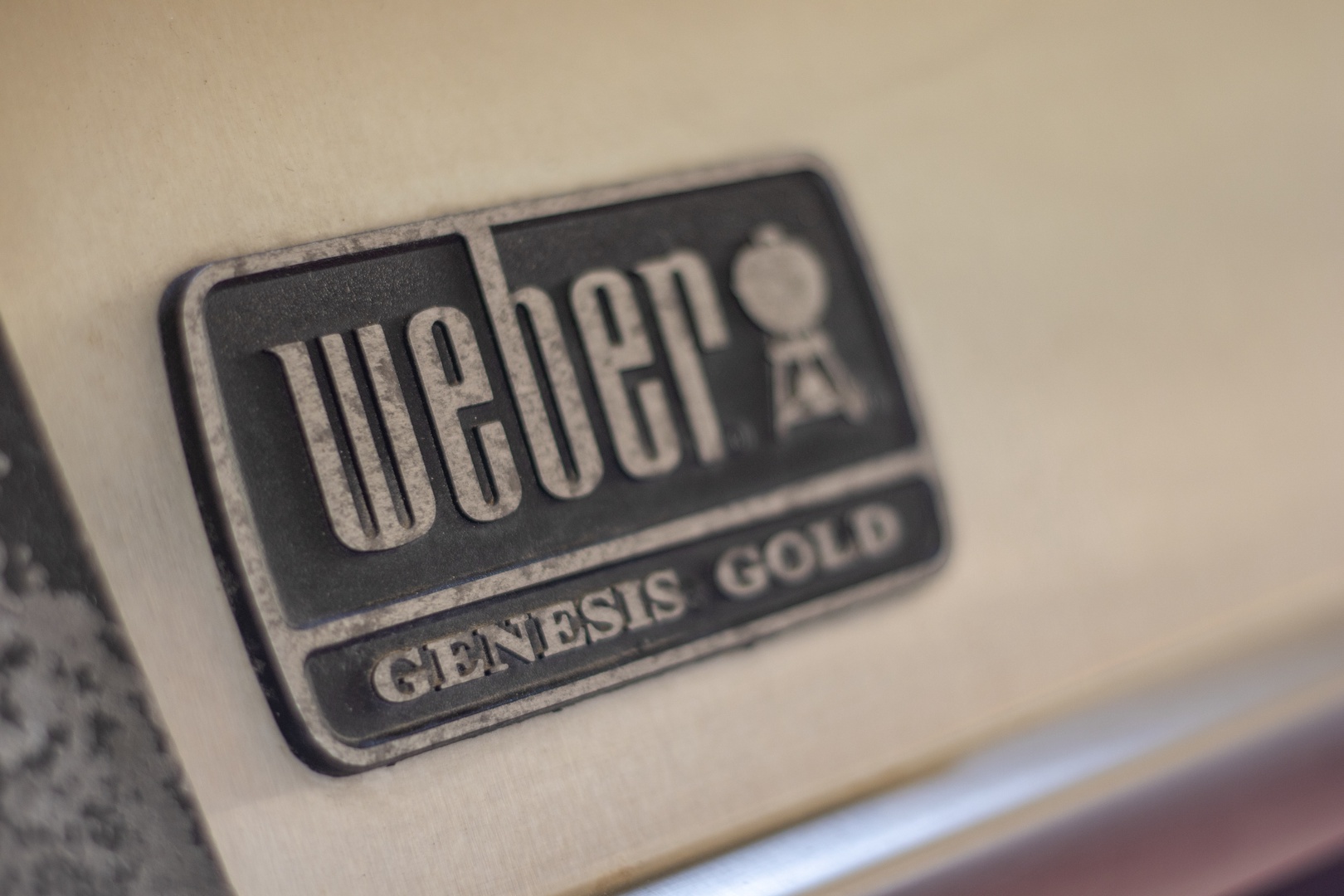 A premium Weber Genesis Gold grill awaits your culinary creations, ready to help you cook memorable meals outdoors in style.