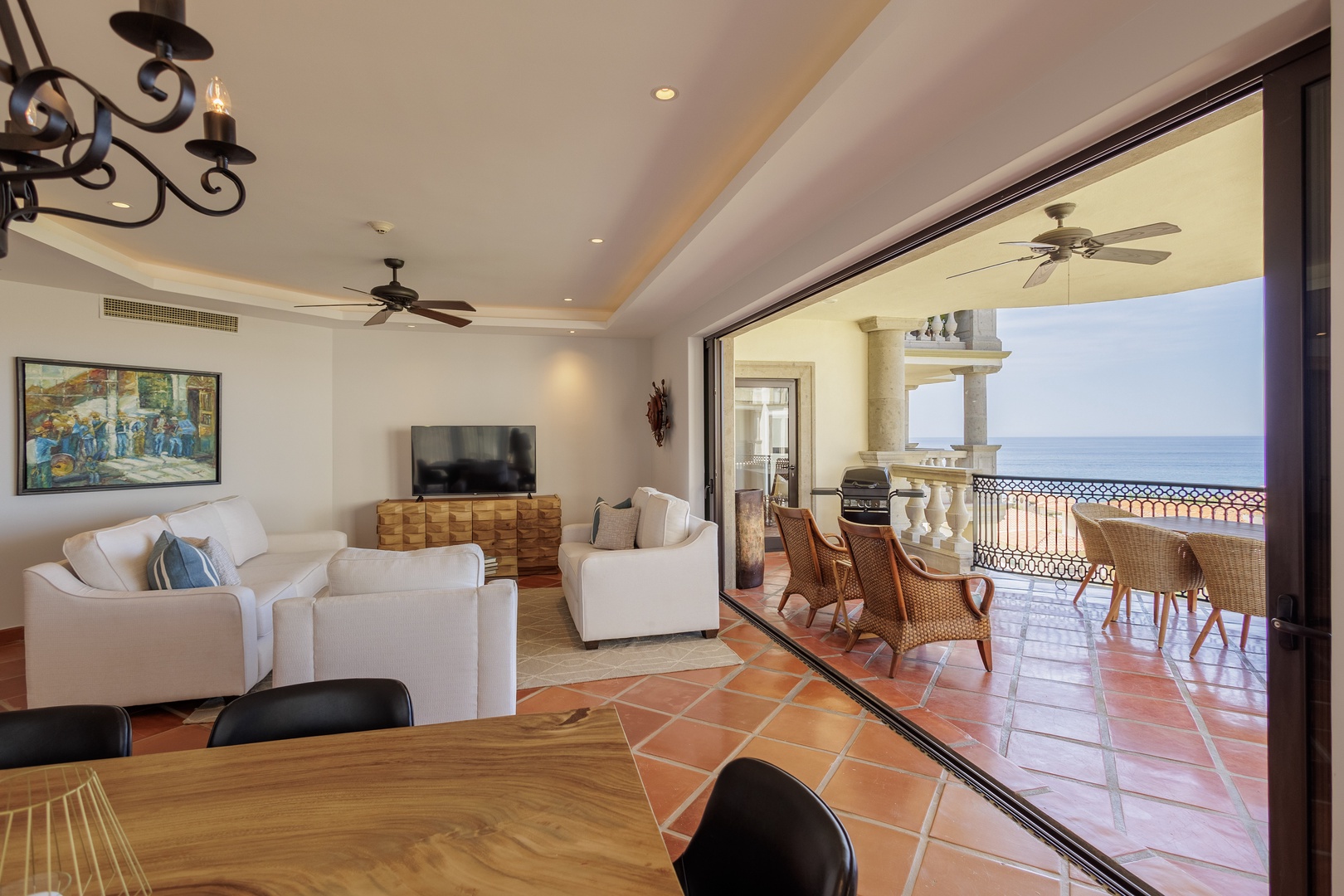 Your spacious living area flows seamlessly onto a private balcony where you can savor endless ocean views and warm coastal breezes.