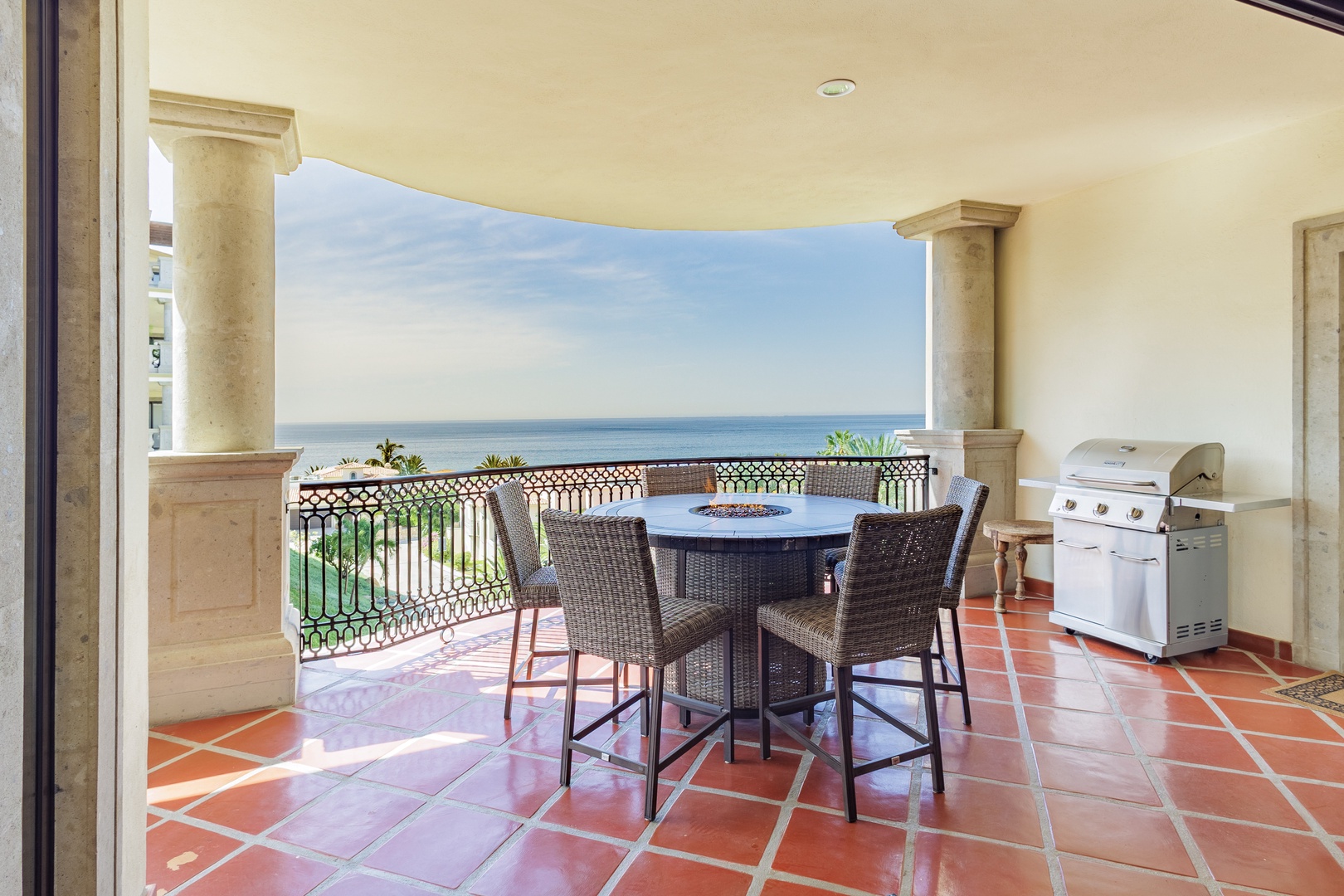 Your private balcony offers breathtaking ocean views, perfect for morning coffee or sunset cocktails. Gather around the fire pit table and savor fresh grilled meals prepared on your personal BBQ.