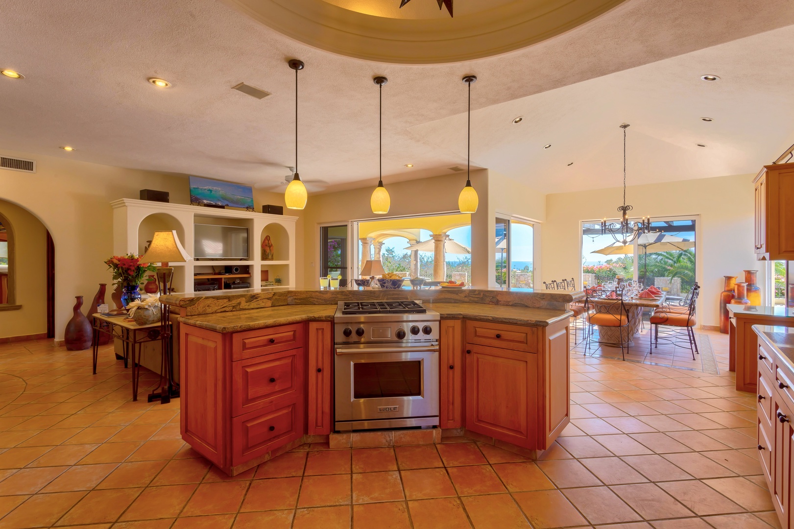Your spacious gourmet kitchen awaits with professional-grade appliances and warm wood cabinetry, perfect for creating memorable meals together.