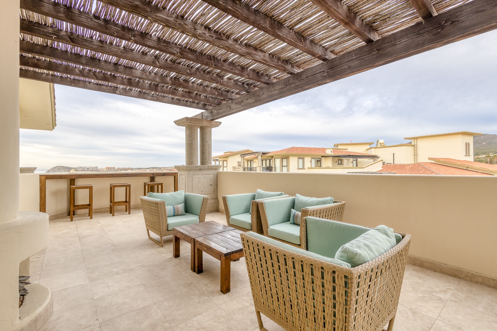 Unwind in your private rooftop terrace with plush seating, sheltered by a rustic pergola. Sip morning coffee or evening cocktails while soaking in rooftop views.