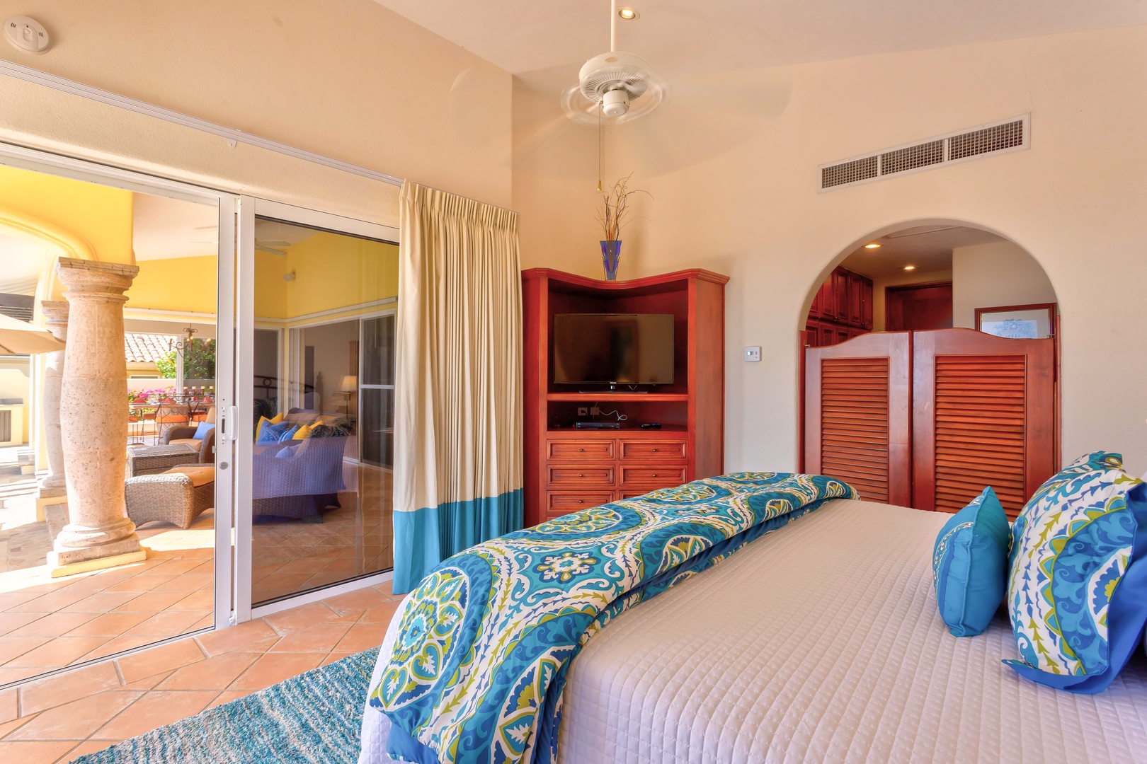 Wake up to colorful Mexican charm with vibrant decor, terrace views, and a comfy king bed calling your name.
