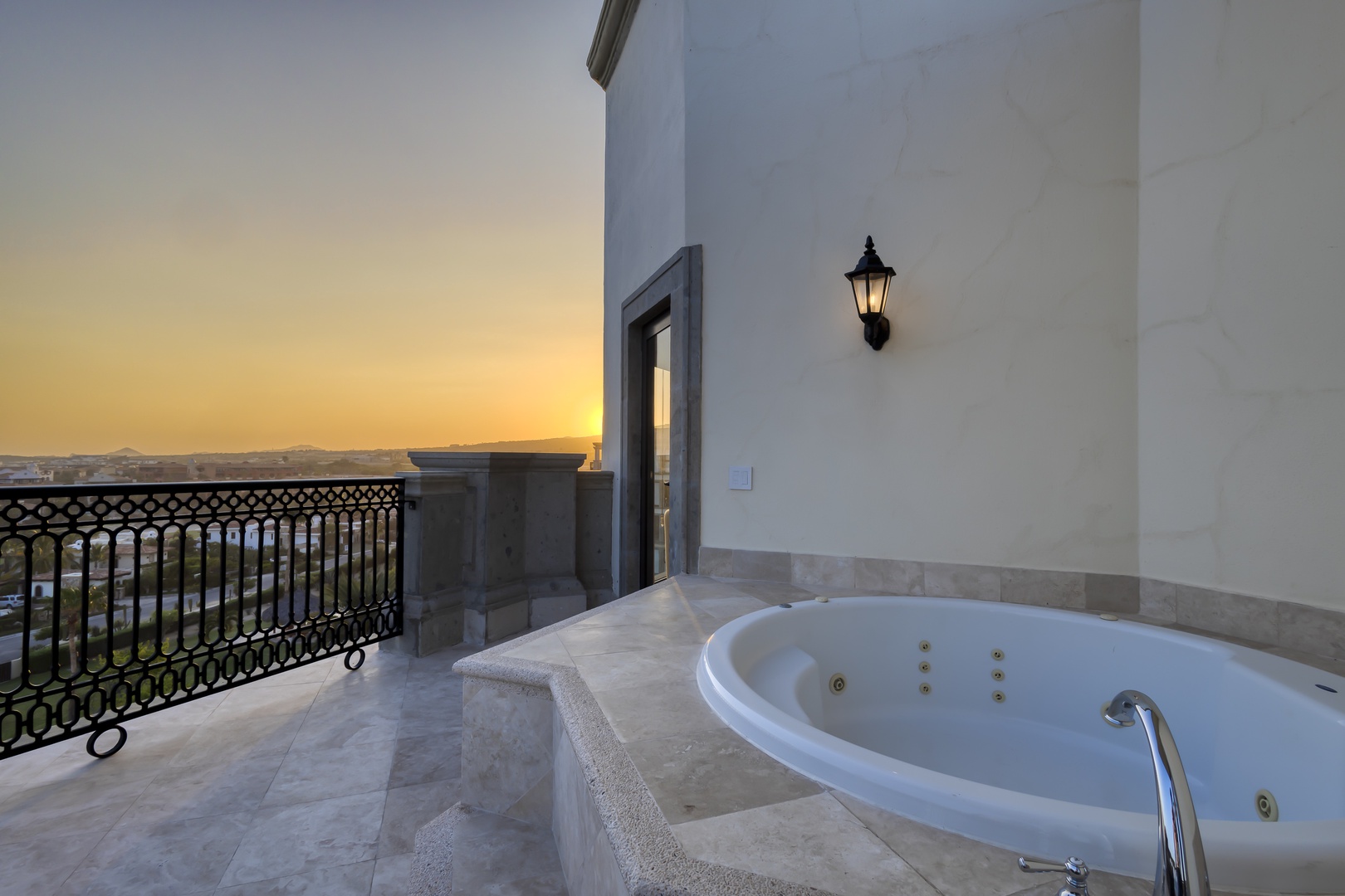 Soak under the stars in your private hot tub while golden sunsets paint the horizon—a peaceful retreat made just for you.
