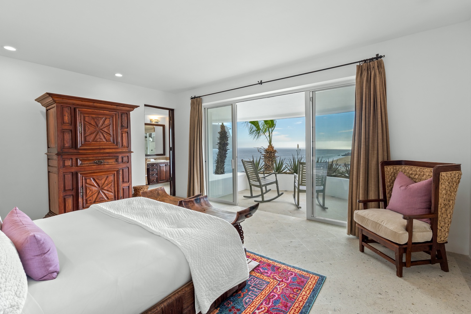 Wake up to stunning ocean views from your private bedroom balcony, where tropical breezes and endless blue waters create the perfect retreat.