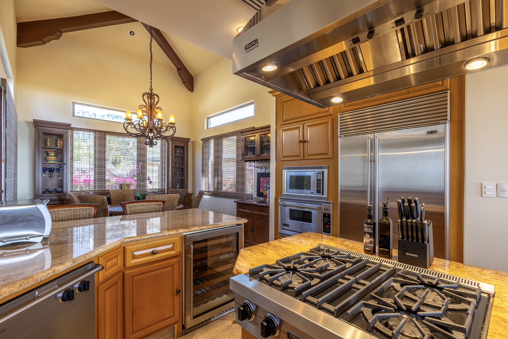 A chef-inspired kitchen awaits with pro-grade appliances and gleaming countertops, ready for you to create memorable vacation meals in a space that blends elegance and function.