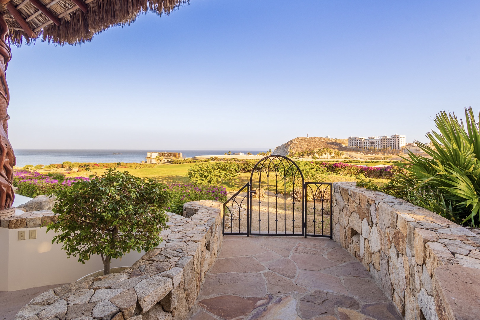 Private terrace with coastal views, lush gardens, and direct access to manicured grounds—your peaceful outdoor retreat awaits.