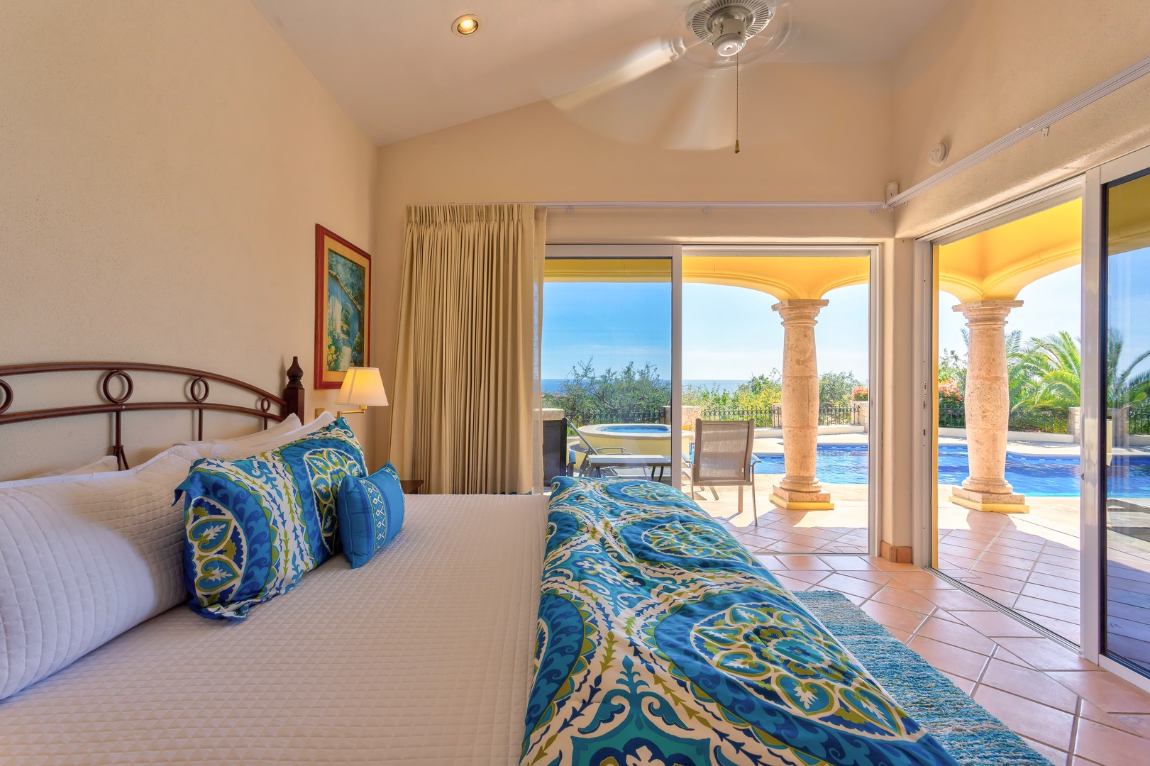 Wake up to stunning pool views through floor-to-ceiling windows that frame your private paradise. Your elegant suite opens directly to the terrace.