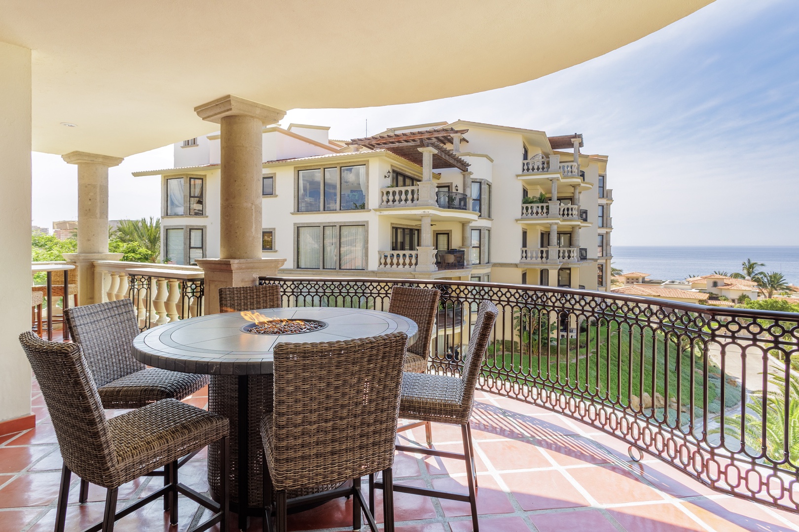 Sip your morning coffee at this inviting terrace table while soaking in stunning sea views and the coastal breeze—your own private perch for relaxing or dining outdoors.