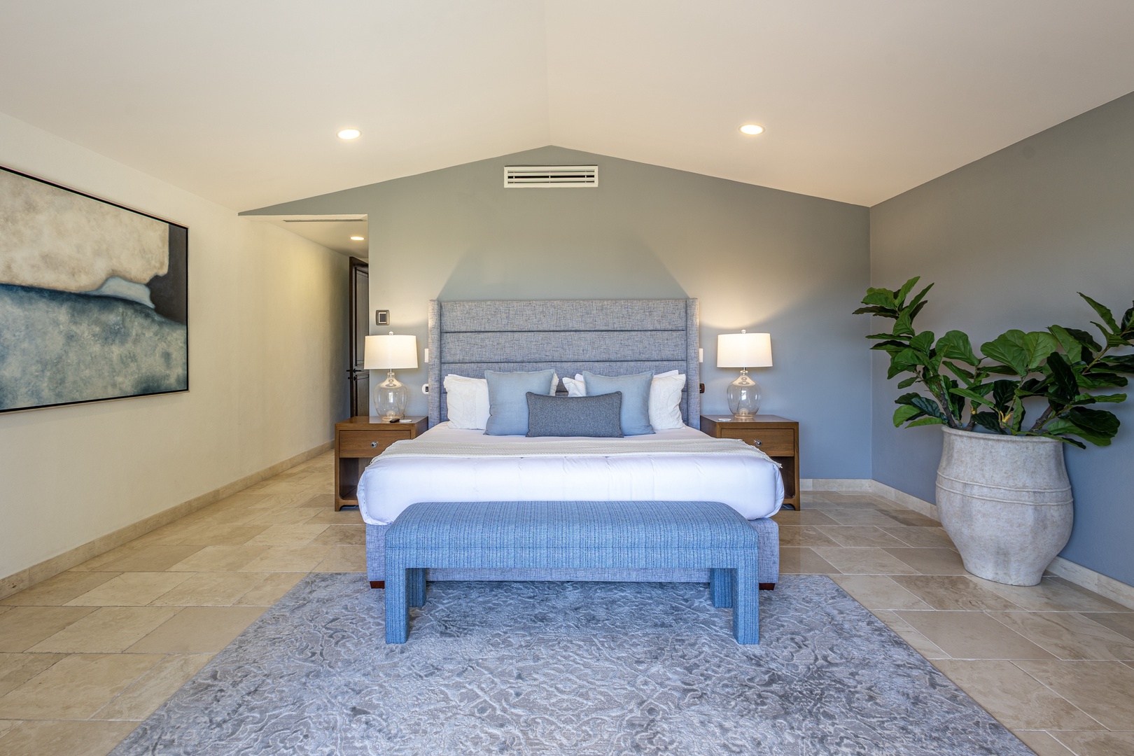 Your spacious retreat features soft linens, ambient lighting, and tranquil blue tones—perfect for unwinding after exploring nearby attractions.