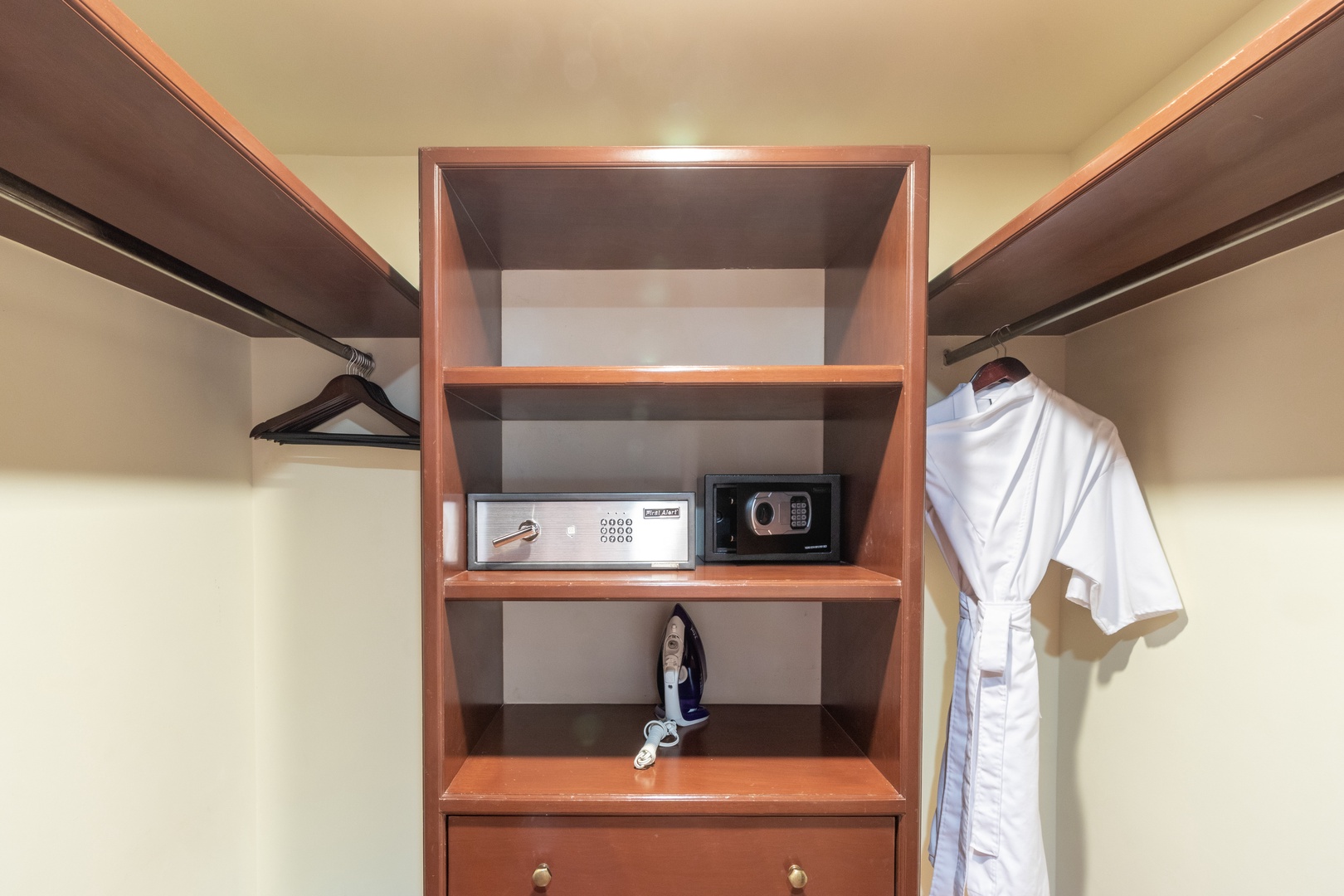 Store your belongings in this organized closet complete with hanging rods, shelving, an iron for touch-ups, and a secure in-room safe for your valuables.