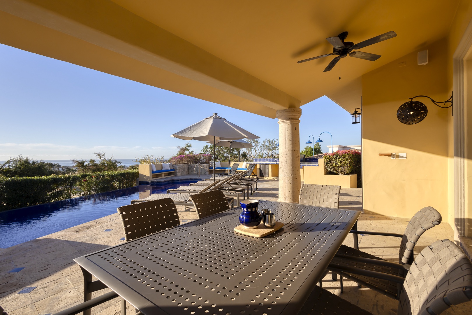 Enjoy sunset dinners on your covered terrace with pool and ocean views stretching to the horizon.