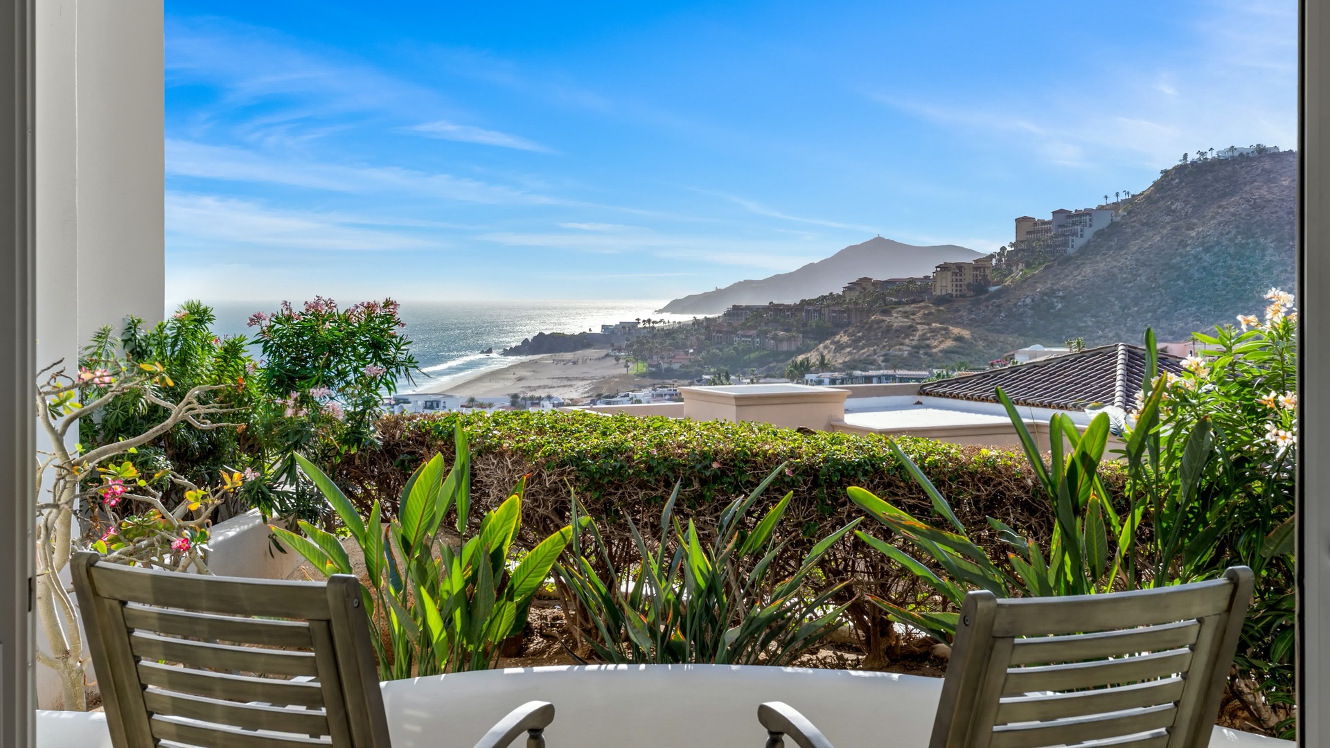 Enjoy breathtaking ocean and mountain views from your private terrace, where morning coffee feels magical.