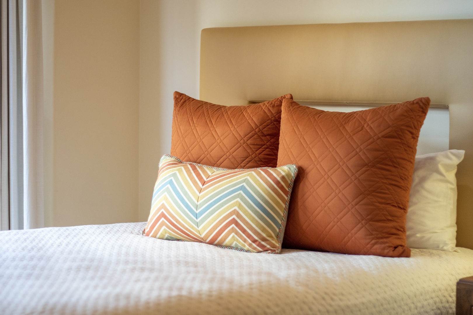 Sink into plush comfort with these inviting textured pillows and soft linens—your personal retreat awaits for restful nights and peaceful mornings.