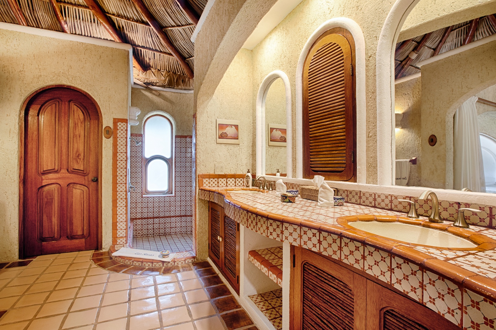 Step into your private sanctuary featuring handcrafted tile work, warm wood accents, and authentic Mexican design that makes every moment feel luxurious.