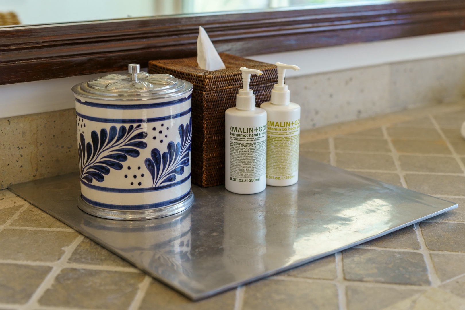 Thoughtful touches await in your bathroom with luxurious hand soap, soft tissues, and elegant ceramic details creating a spa-like retreat.