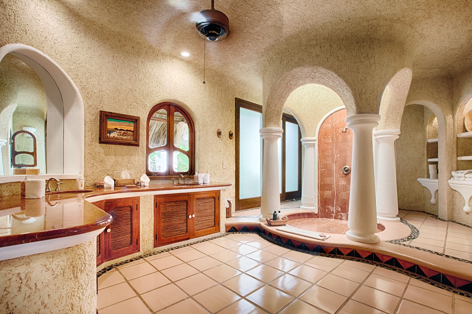 Step into your private spa sanctuary with elegant arches, rich marble surfaces, and a luxurious sunken tub waiting for your relaxation.