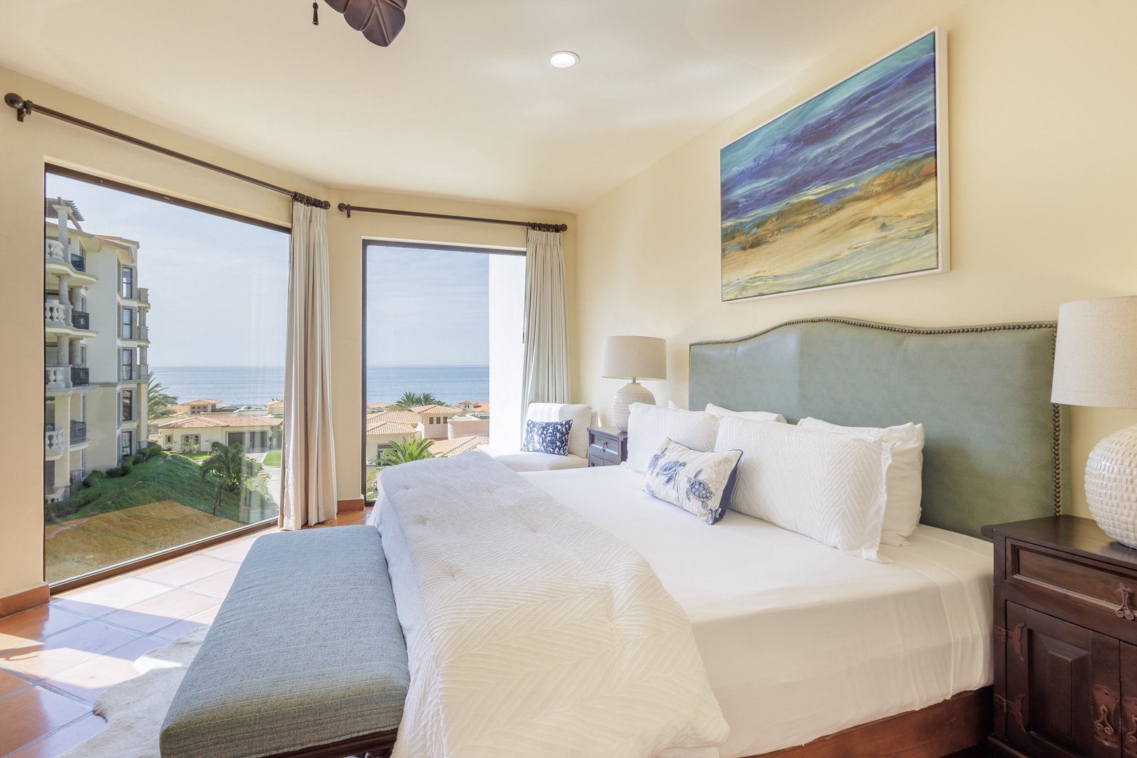 Wake up to stunning ocean views from your peaceful bedroom retreat, where soft linens and coastal decor create the perfect sanctuary for restful mornings and tranquil evenings.