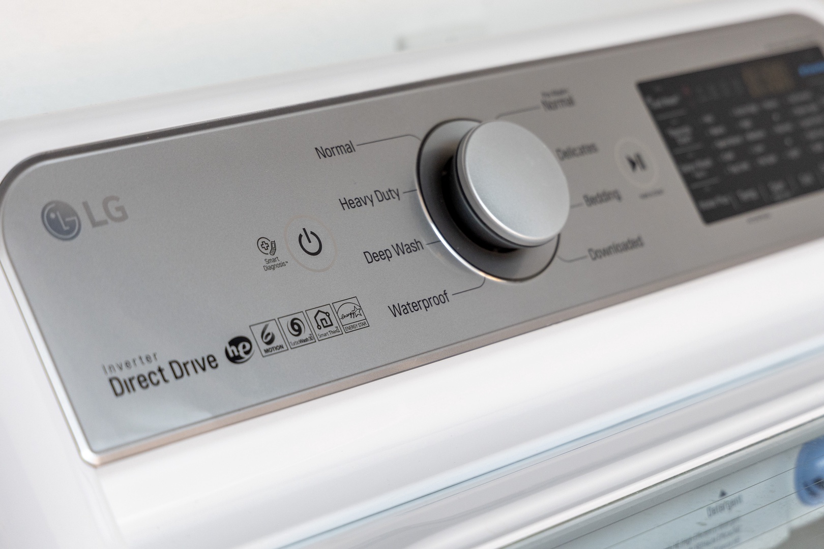 Your laundry stays effortless with this modern LG Direct Drive washing machine, offering multiple wash settings for all your vacation clothing needs.