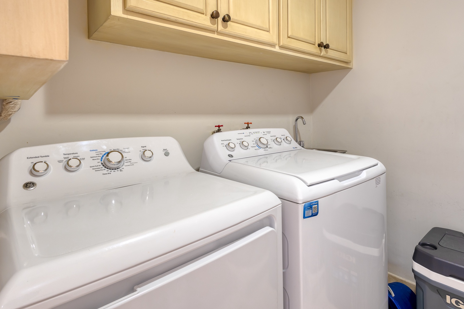 Your dedicated laundry space features a full-size washer and dryer with a convenient utility sink, making it easy to keep your vacation wardrobe fresh.