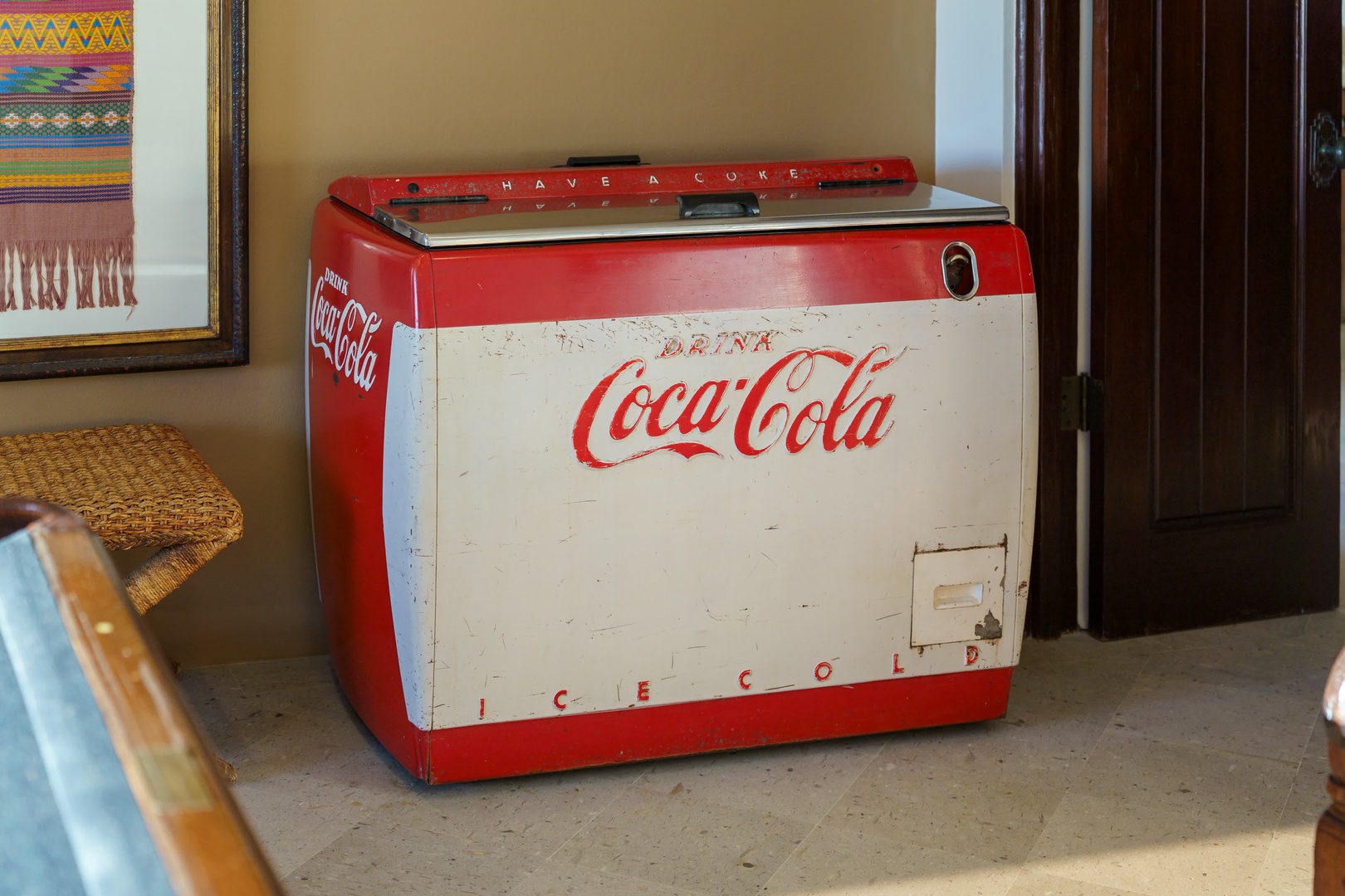 Discover a charming vintage Coca-Cola cooler that adds nostalgic character to your stay, perfectly complementing the warm, inviting atmosphere.