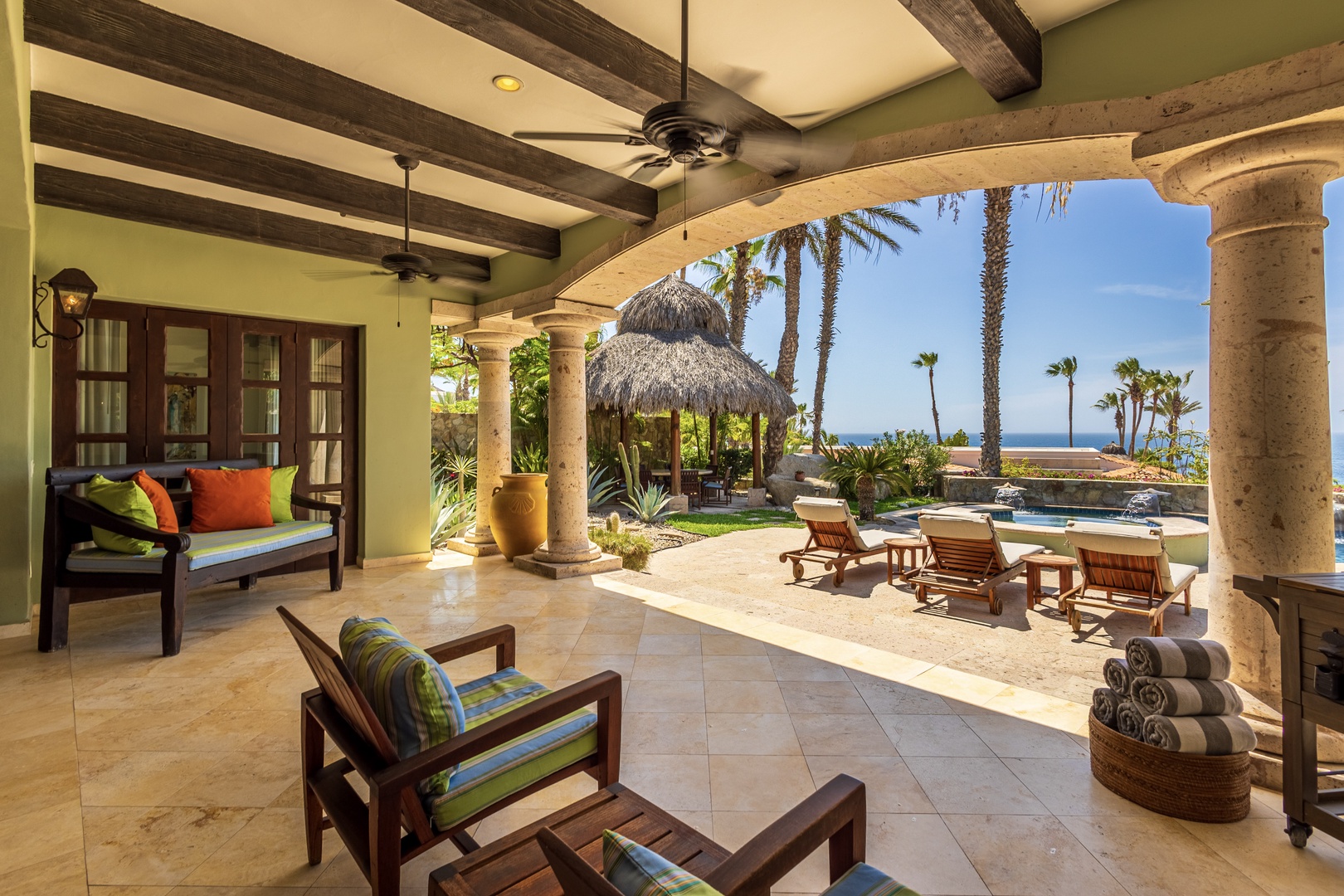 Your private oasis opens to paradise, where tropical breezes meet luxury comfort in this stunning poolside retreat.