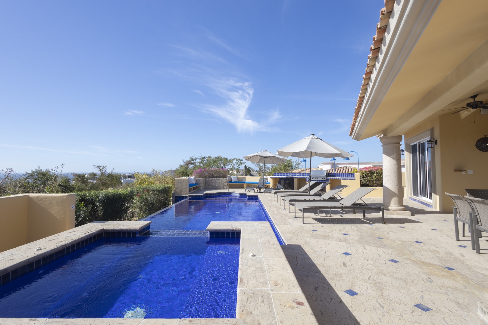 Dive into your private oasis with this stunning infinity pool, where crystal-blue water meets endless sky views.
