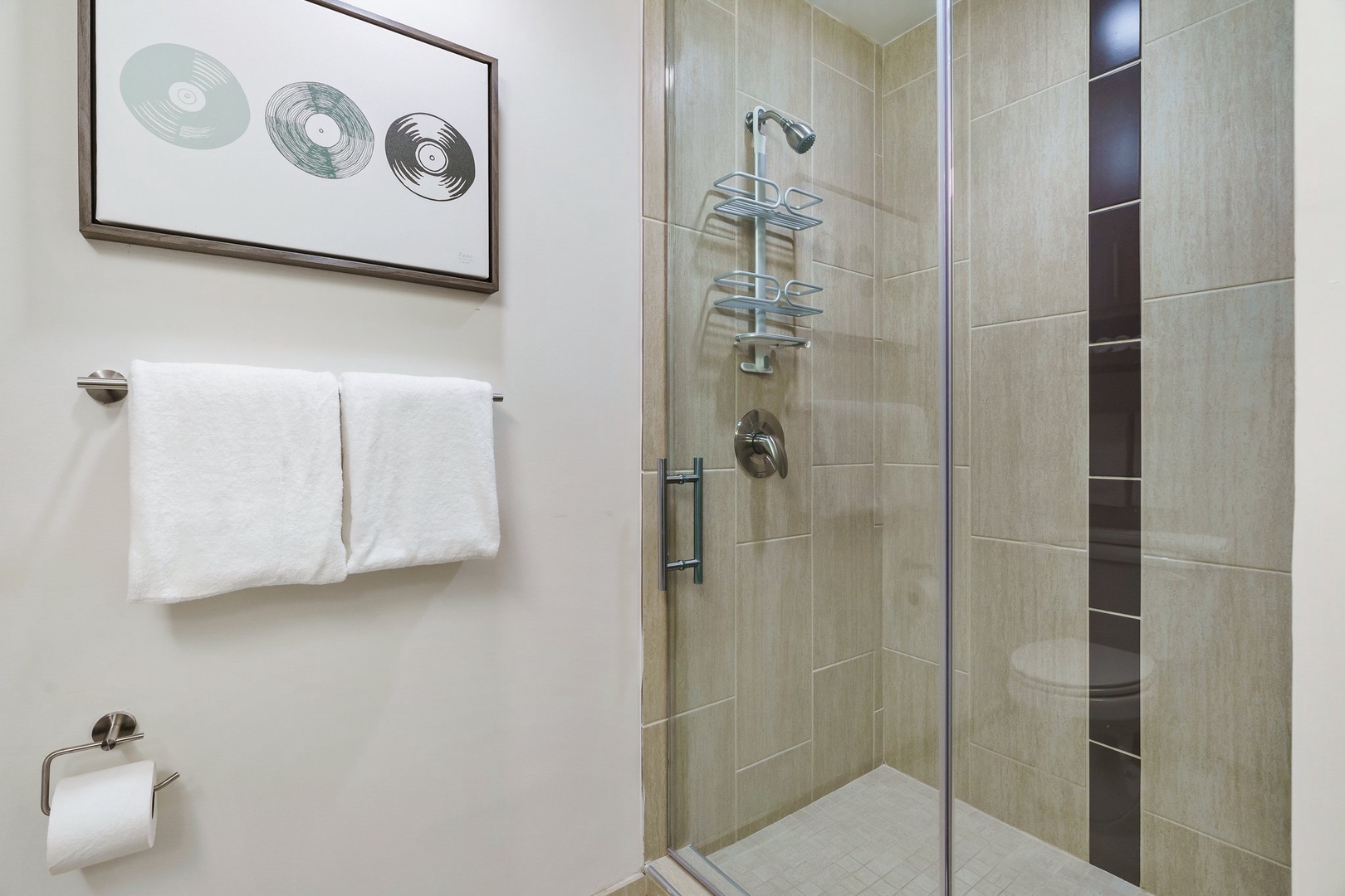 Start your day refreshed in the walk-in shower with modern fixtures.