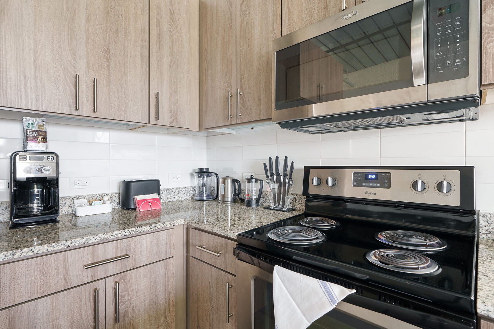 Prepare culinary masterpieces in this modern kitchen with all the essentials.